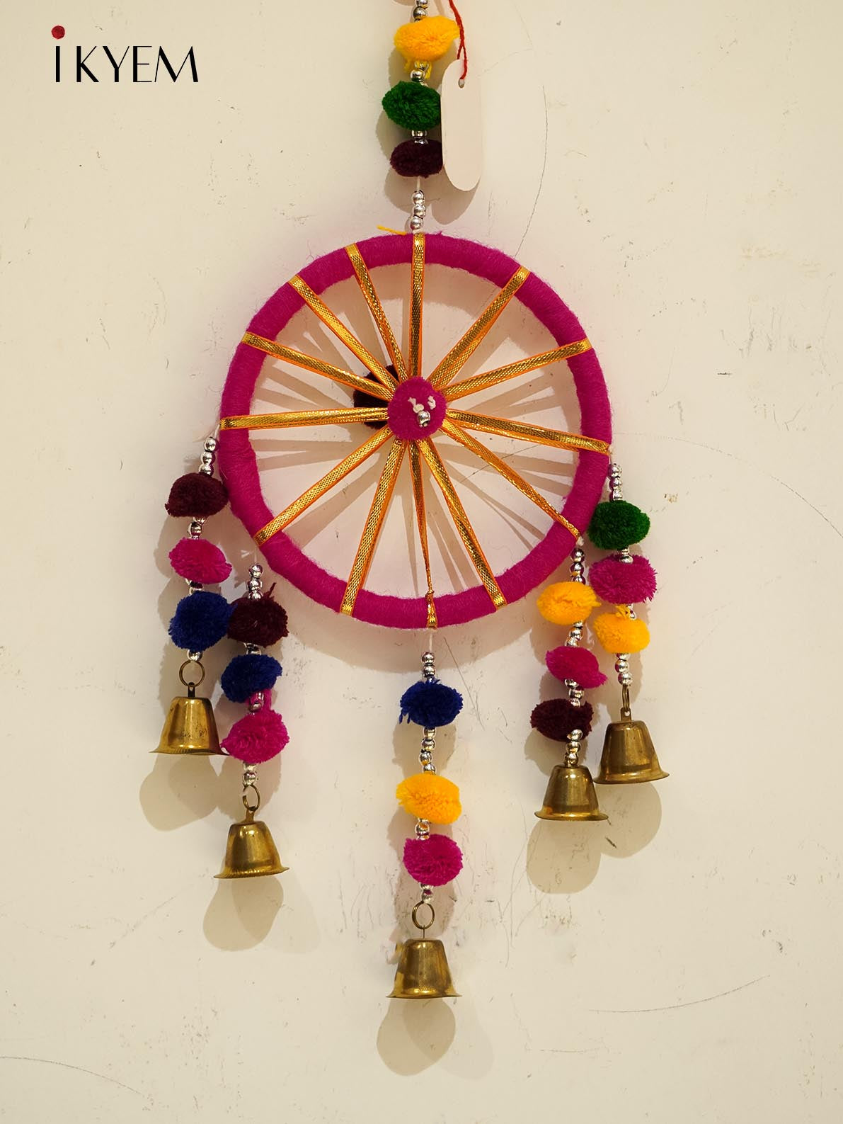 Golden chakri with woolen pompom & Bell