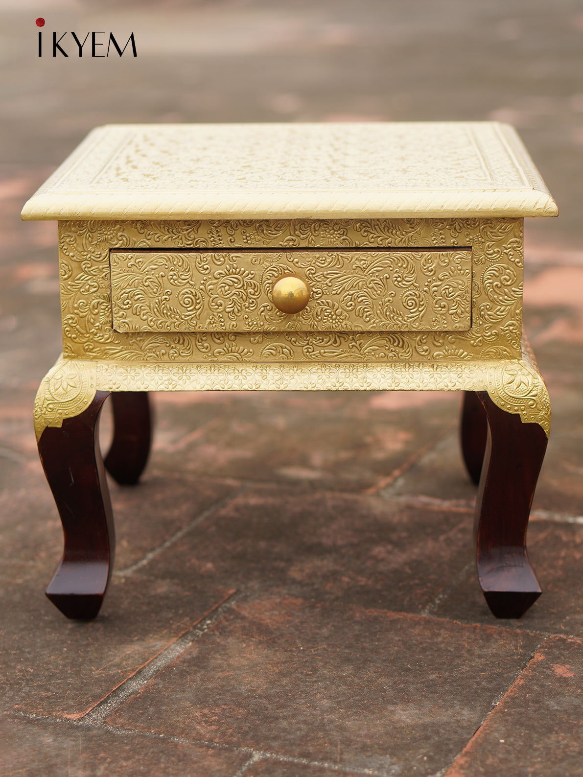 Brass Embellised table with drawer