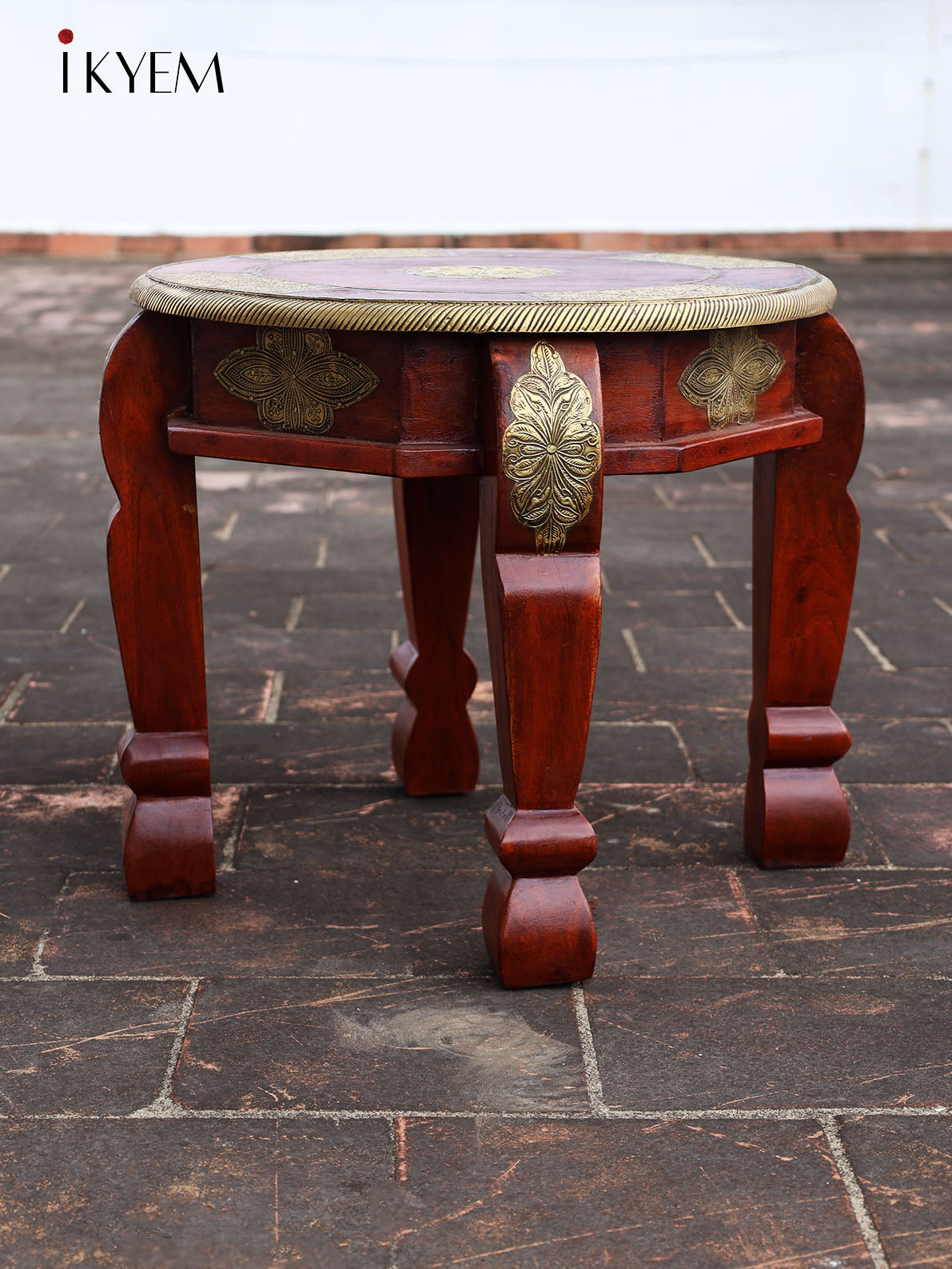 Wooden Table With Brass Embellishment