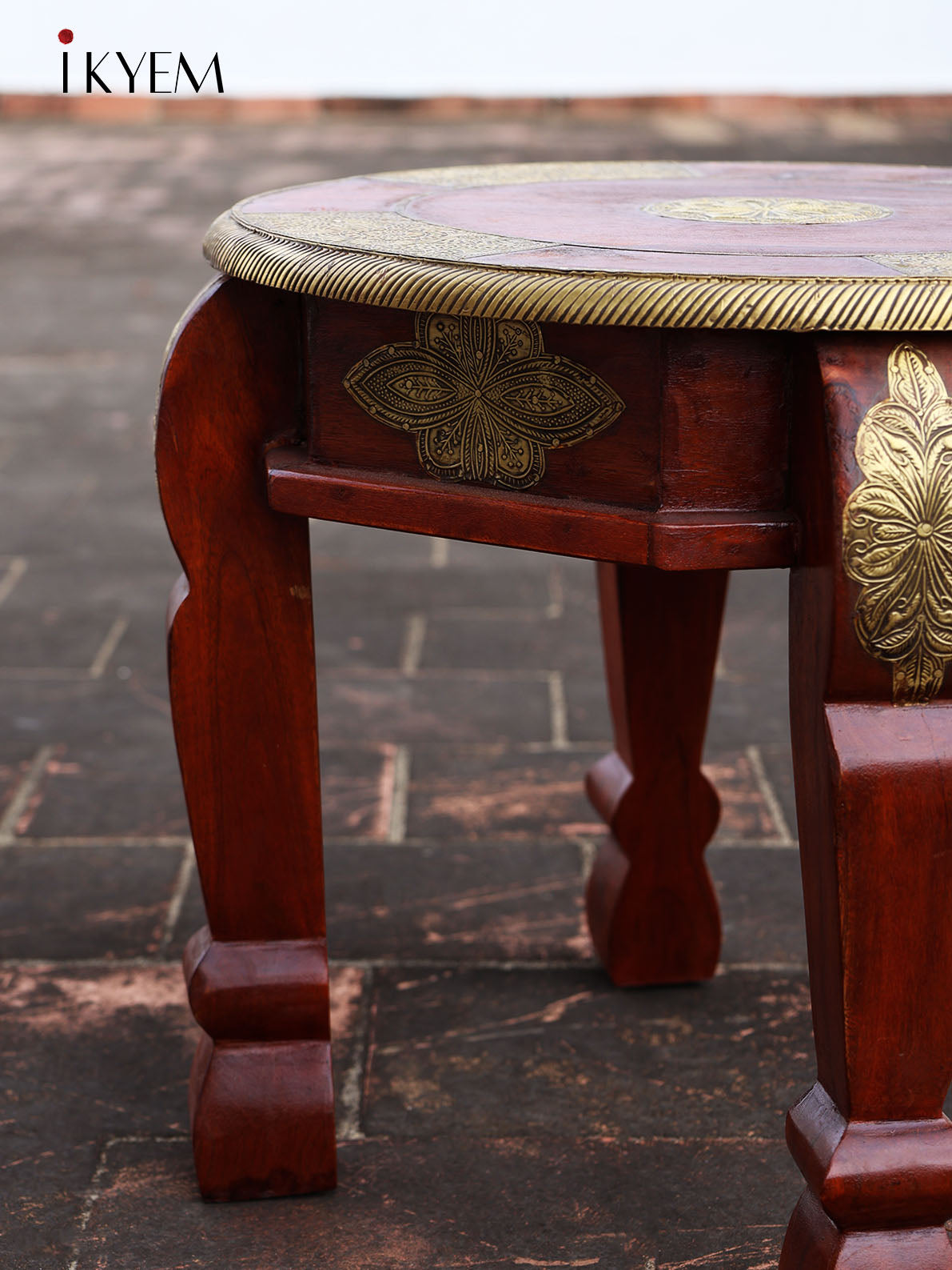 Wooden Table With Brass Embellishment