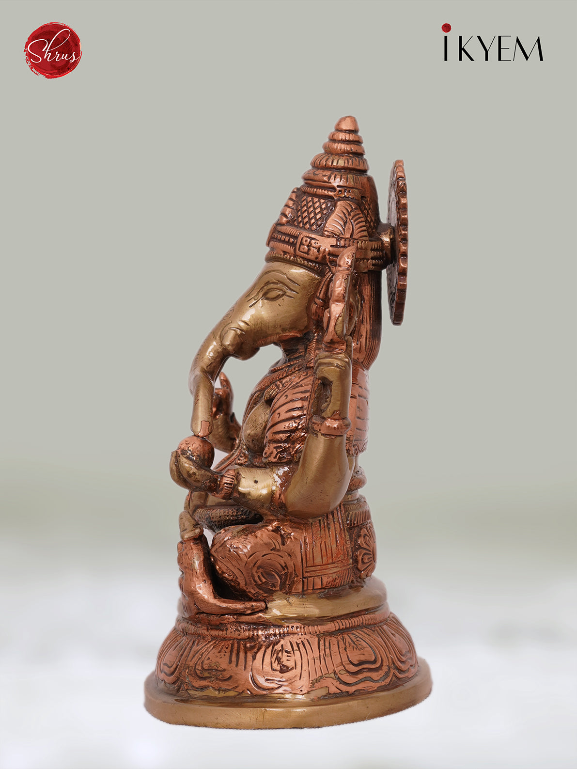 Ganesha sitting on Oval Base - Dual Tone (Brass & Copper), Enhances your Pooja room Aura