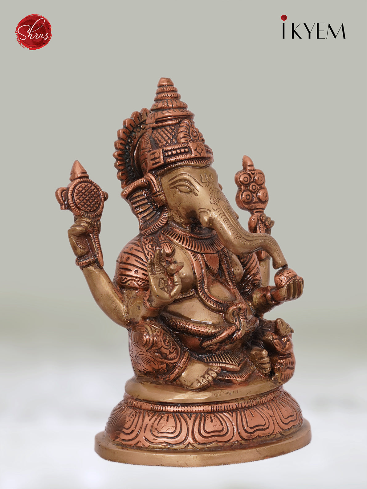 Ganesha sitting on Oval Base - Dual Tone (Brass & Copper), Enhances your Pooja room Aura