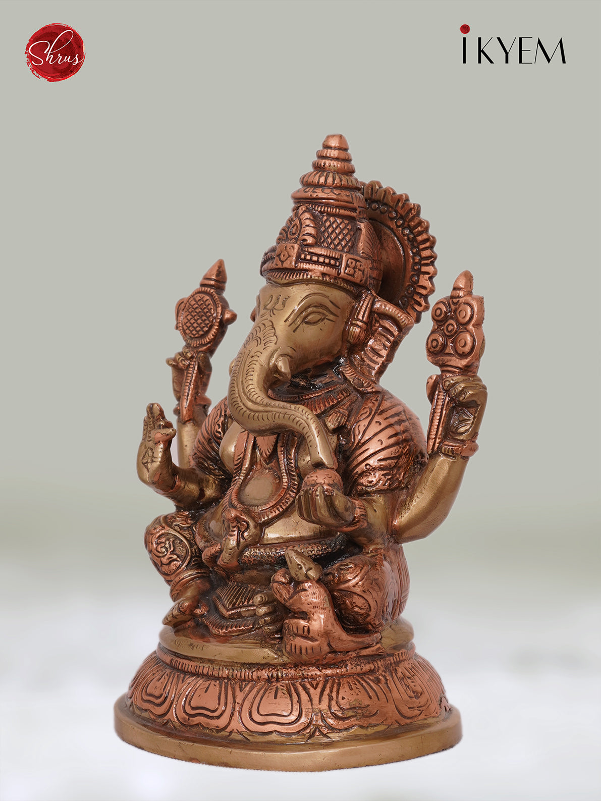 Ganesha sitting on Oval Base - Dual Tone (Brass & Copper), Enhances your Pooja room Aura